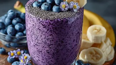 Refreshing Banana-Blueberry Smoothie in a glass with fresh fruit
