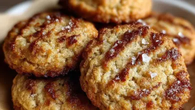 Freshly baked banana bread cookies on a cooling rack