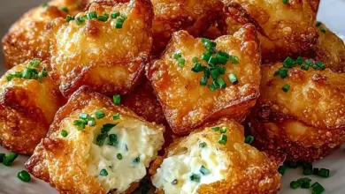 Delicious homemade Crab Rangoon Bombs served with dipping sauce