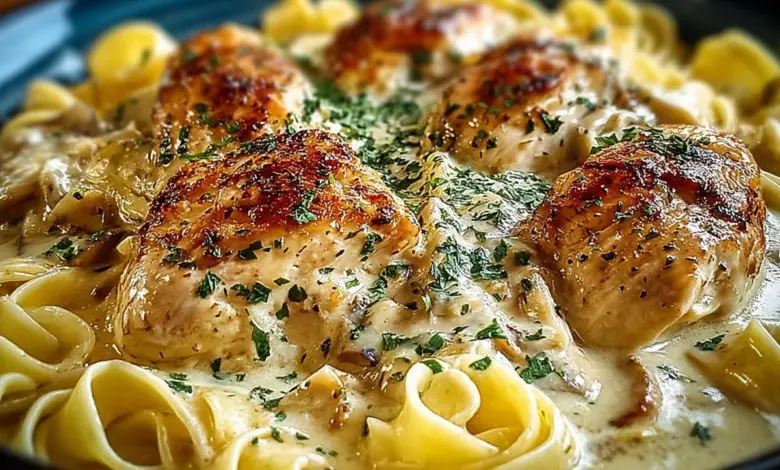 Delicious Crockpot Angel Chicken served on a plate with fresh herbs.