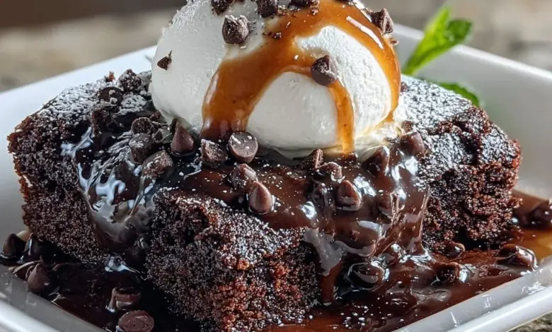 Delicious hot fudge pudding cake served warm with melted chocolate sauce