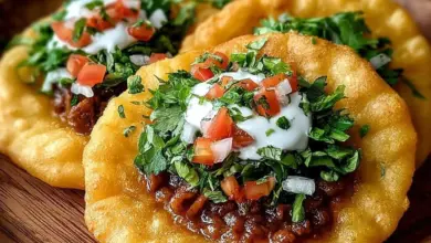 Delicious Indian fry bread tacos filled with savory ingredients.