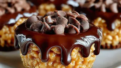 Delicious chocolate peanut butter rice krispie cups on a white plate