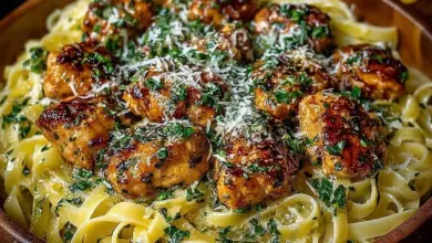 Plate of Lemon Garlic Butter Chicken Bites with Savory Parmesan Linguine