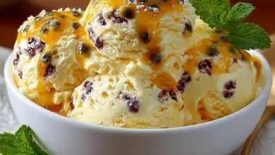 Delicious bowl of homemade Passion Fruit Ice Cream topped with fresh fruit