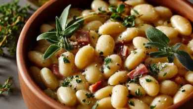 Delicious Southern butter beans served in a bowl with herbs.