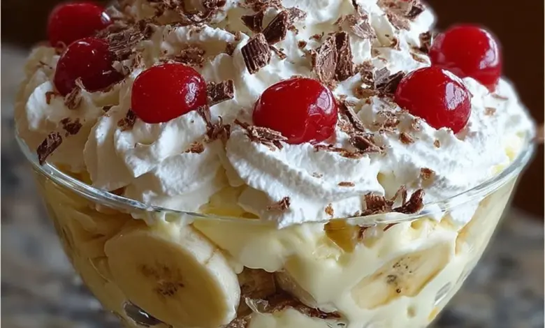 Delicious Banana Split Fluff dessert with layers of banana, whipped cream, and chocolate sauce.