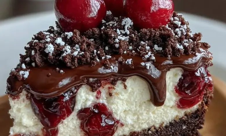 Slice of Black Forest Cheesecake topped with chocolate shavings and cherries