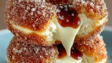 Churro Cheesecake Donut Cookies fresh out of the oven, sprinkled with cinnamon sugar.