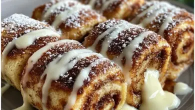 Delicious cinnamon roll french toast roll-ups served on a plate