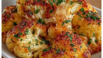 Plate of crispy roasted cauliflower with seasoning, ready to serve