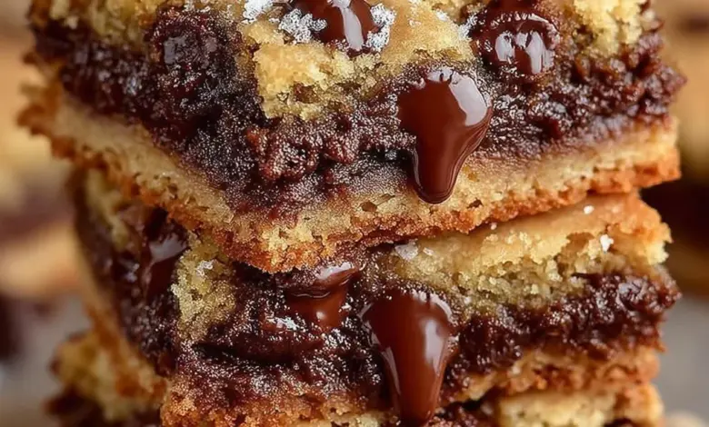 Gooey chocolate chip cookie bars on a cooling rack