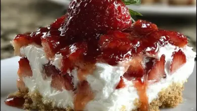 No-Bake Strawberry Cheesecake Lasagna served on a plate