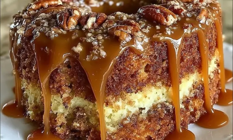 Delicious Southern Pecan Caramel Cake topped with caramel and pecans