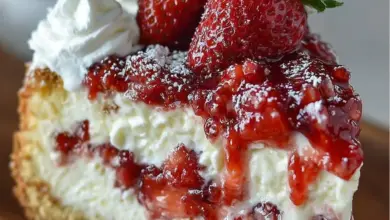 Strawberries and Cream Dream Layer Cheesecake Cake with fresh strawberries and creamy layers