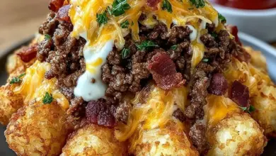 Bacon cheeseburger stuffed tater tot cones served on a plate