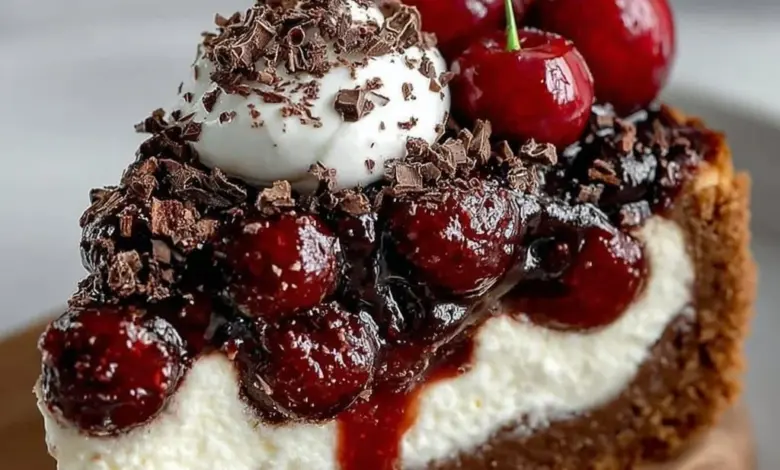 Delicious Black Forest Cheesecake topped with cherries and chocolate shavings