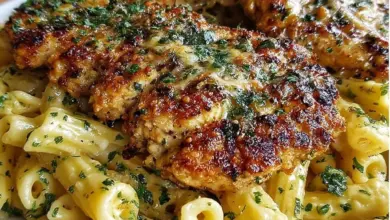 Cheddar Parmesan Garlic Butter Chicken served with creamy penne pasta