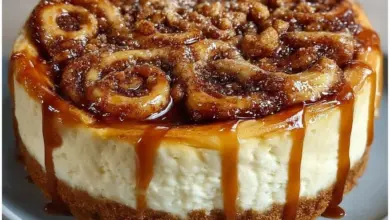 Delicious Cinnamon Roll Honeybun Cheesecake with swirls and topping