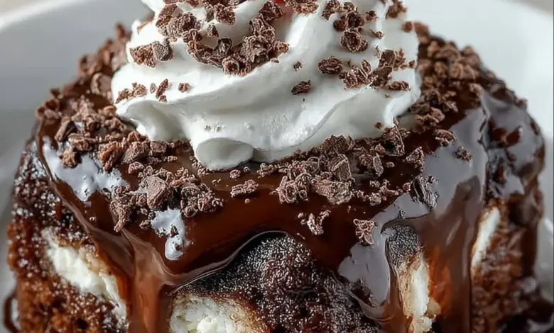 Death by Chocolate Poke Cake topped with chocolate frosting and ganache