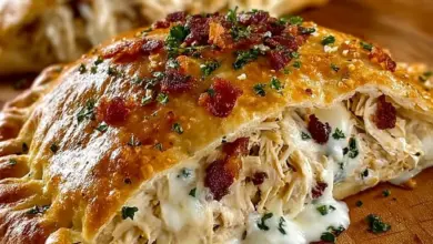 Delicious chicken bacon ranch calzone filled with creamy ranch and crispy bacon