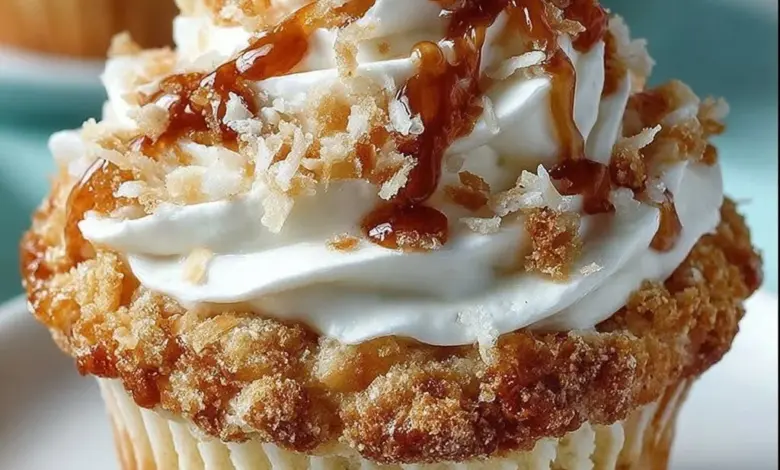 Delicious coconut cream pie cupcakes topped with creamy coconut frosting.