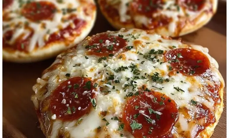 Delicious English muffin pizzas topped with cheese and vegetables