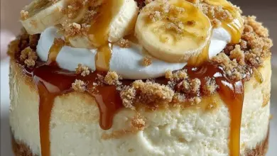 Heavenly Banana Pudding Cheesecake with layers of bananas and creamy filling