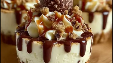 Mini no-bake Malteser cheesecakes topped with chocolate and Maltesers
