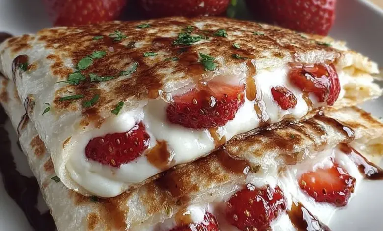 Delicious strawberry cheesecake quesadillas served on a plate