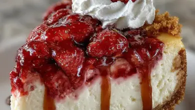 Delicious Strawberry Dream Cheesecake topped with fresh strawberries