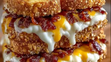 Delicious Triple Cheese Bacon Melt sandwich topped with crispy bacon and three types of cheese